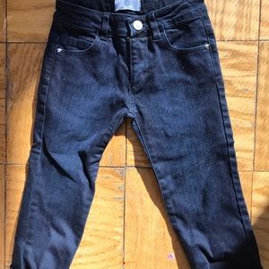 Young Versace dark colored jeans